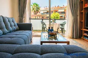 Apartamento Santa Cristina & Bright 2BR with Balcony, Pool & Garden View- Fenals - Image 1