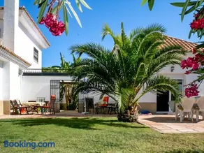 Elegant Villa in Nuevo Portil with Shared Pool - Image 5