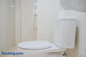 Spacious and Elegant 2BR M-Town Serpong Apartment By Travelio - Image 4