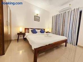 Premium 2BHK Assagao Apartment with Pool, WiFi & Scenic Balcony View - Image 1
