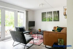 Grove Den I Heerlijk vakantiehuis met bosrijke tuin - Image 5