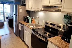 Boardwalk Condo with Ocean View Balcony & Pool - Image 3