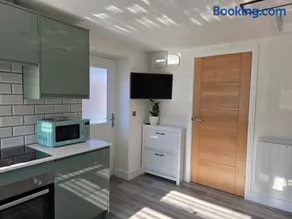 Modern Converted Garage in Private Garden Setting in Kingswood - Image 5