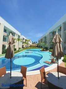 Guarajuba Porto Smeralda Village C02, térreo - GUARAJUBA TEMPORADA, viva mais de uma experiência de hospedagem conosco! 130m da praia - Image 1