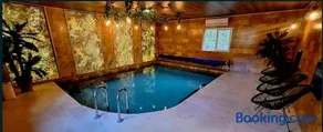Cabana Moldovan Baisoara cu piscina interioara, ciubar, spa - Image 1