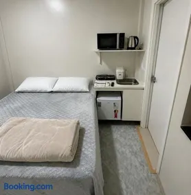 Loft Lux SM Chapecó | Conforto e Praticidade com Ar, Cozinha e Smart TV - Image 2