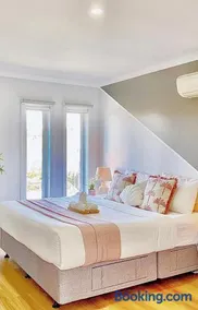Modern Family Oasis - 4BR, Free Parking, Steps to Shops & Train - Image 3