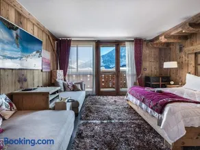 Superbe chalet avec 5 chambres, jacuzzi et services de luxe, à 300m des pistes à Courchevel Village - Image 3