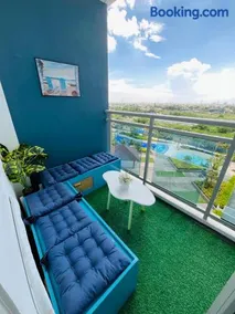 Beach Vibe Condo with PS4, Mini Karaoke, Board Games in Azure North San Fernando Pampanga - Image 1