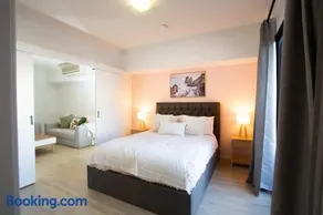 Chic 1BR Apt by RAC Arena w Pool & WiFi - Image 1