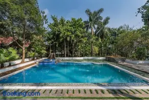 SaffronStays Foresta by the Lake - 4BR veg-only pool estate with lake views, lawns, gazebo & sports court in Kamshet - Image 1