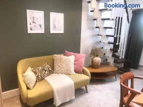 En-suite with double bed on mezzanine and desk in family home - Image 4