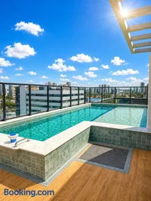 Flat moderno com piscina, garagem e self check-in - Image 1