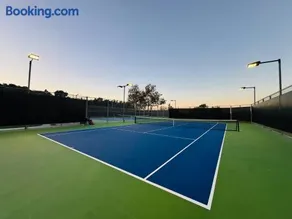 Resort-style Gated Coastal Retreat Pool Tennis - Image 2