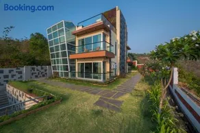 SaffronStays Nautica - 5BR hilltop villa with rooftop pool, sea views & modern interiors surrounded by greenery - Image 4