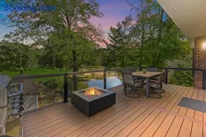 Modern Waterfront Retreat with Hot Tub & Pond Views - Image 4