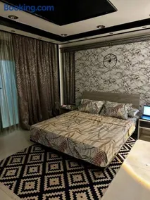 A private room exclusively for men, offering comfort and convenience for a relaxing stay - Image 1