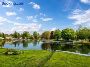 Canalside Summer Cottage with Waterview, Custom Bar, BBQ, and Fireplace - Image 3