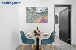 Bright Comfort Studio with Kitchen and Cozy Bed - Image 5
