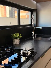 Apartamento moderno, a 200 metros da praia com pátio,piscina e churrasqueira privativa 2 vagas de garagem - Image 3