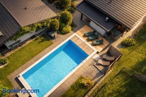 NINA's Chalet with Pool & Sauna Access - Image 1