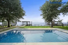 Unique lakefront home with private pier, stunning views, and a pool - Image 3