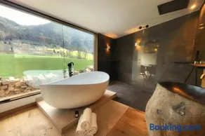 stylische Alpenlounge mit Pool, Blockhaus-Sauna und Jacuzzi für bis zu 12 Personen - Image 2