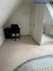 Modern Suite with a Queen Bed, Ensuite & Workspace - Image 4