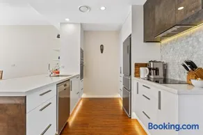 Sleek Modern Pad next to Spark Arena Zodiak Stays - Image 3