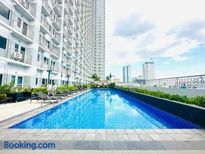 Coast Residences - 2 Bedroom with Balcony facing Mall of Asia, Manila Bay & Pool View - Image 2