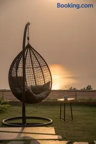 SaffronStays Nautica - 5BR hilltop villa with rooftop pool, sea views & modern interiors surrounded by greenery - Image 3