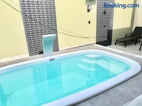 Casa com Piscina, Ar e Lazer Completo - Image 3