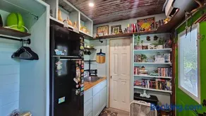 Pickles Place is a Stacked container home in the Texas Hill Country this space is surrounded by giant Elm trees lush greenery across the street from the San Gabriel river one double bed full size shower & full kitchen plus BBQ pit & flategrill - Image 2