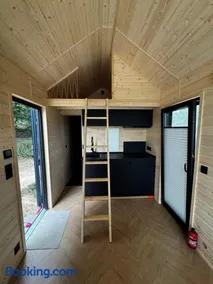 Tiny House Kolpa- A Modern Forest Escape Above River Kolpa - Image 4