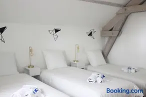 L'Équinoxe - Parking privé - Cocoplume Suites - Image 4