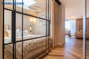 P R A T U M Pink&Blue Mikołajki - Apartament 22 Elegance z widokiem na jezioro - Image 1