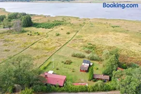 Sjötomt med privat brygga, roddbåt & solnedgång - Image 2