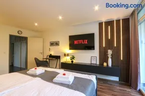 Design-Ferienwohnung direkt am Möhnesee - mit Seeblick, Balkon, Pool und Sauna - Image 2