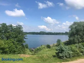 House next to a lake - Image 3