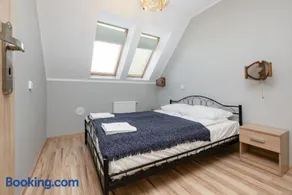 Peaceful Apartment Wrzosowo Bay with Parking by Noclegi Renters - Image 1