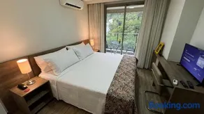 Suíte Econômica com Conforto de Luxo Próxima à Praia e aos Eventos - Image 1
