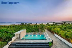 SaffronStays Mango Lakeview Villa - 3BR pool villa amid mango farms with Gangapur Dam views, deck & games - Image 1