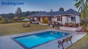 SaffronStays Green Lawns - Image 2