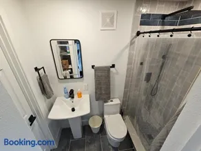 Sanford Suite King Bed Work-Ready with 60 in Google TV and Rainfall Shower - Image 4