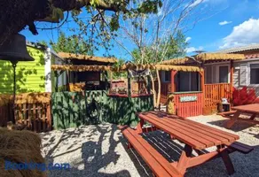 Wild West-style accommodation featuring 2 mobile homes and 2 huts - Image 1