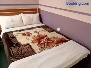 The Coconut Palm Hotel - Image 2