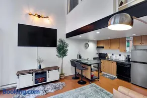Stylish Two-Story Loft with Rooftop Deck - Image 1