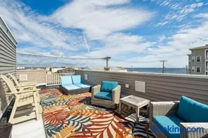 Ocean Hideaway Rooftop Deck Fireplace - Image 1