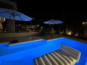 The Poolside Pavilion Private Resort-Style Tiny Home - Image 1