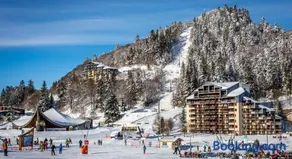 Superbe Appart aux pieds des pistes de ski avec balcon-parking et casier - Image 1